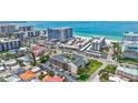 An aerial view of the condo community, with lush landscaping and convenient beach access at 845 Benjamin Franklin Dr # 302, Sarasota, FL 34236