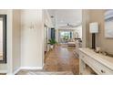Bright foyer with tile flooring, offering a glimpse into the open-concept living space at 11508 Griffith Park Ter, Bradenton, FL 34211