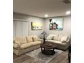 Cozy living room featuring comfortable seating, neutral tones, and stylish decor at 2726 Knoll E St, Palm Harbor, FL 34683