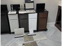 Selection room showcasing various cabinet, countertop and backsplash options at 3607 Santa Caterina Blvd, Bradenton, FL 34211