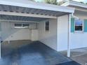 The carport provides covered parking and protection from the elements at 6074 Arlene Way # 5, Bradenton, FL 34207