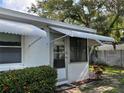 This enclosed sunroom features great natural light and is perfect for relaxing or entertaining at 6074 Arlene Way # 5, Bradenton, FL 34207