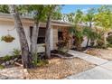 Inviting front entrance featuring well-maintained landscaping and a light colored facade at 642 N Jefferson Ave # 13, Sarasota, FL 34237