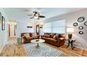 Bright living room with two sofas, a modern rug, and stylish decor at 1010 68Th Nw St, Bradenton, FL 34209