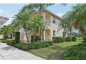 Beautiful two-story condo building with well maintained yard and landscaped with palm trees at 4254 Vicenza Dr # B, Venice, FL 34293