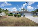Charming one-story home with an attached two car garage and meticulously kept landscaping at 4405 Linwood St, Sarasota, FL 34232