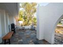 Covered patio area with tile flooring, perfect for outdoor dining and entertaining at 603 Saint Andrews Dr, Sarasota, FL 34243