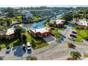 A high angle shot of the building features meticulous landscaping, and convenient parking spaces at 9409 Catalina Dr, Bradenton, FL 34210