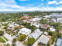 Desirable location with an aerial view of the waterfront, city skyline, and the charming tree-lined neighborhood at 1841 Datura St, Sarasota, FL 34239