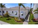 Beautiful exterior of a modern home with well-maintained landscaping and neutral-toned accents at 5910 Red Mangrove Ln, Bradenton, FL 34210