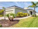 Single-story home boasting a well-maintained lawn and appealing exterior design at 4315 Deep Creek Ter, Parrish, FL 34219