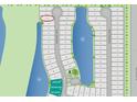 Community map showcasing available lots and amenities, including a dog park, lake, and walking trails at 659 Maldives Trl, Sarasota, FL 34234
