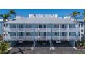 Charming multi-level condo featuring covered parking and multiple balconies at 7000 Gulf Dr # 205, Holmes Beach, FL 34217