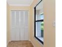 Sunlit entryway featuring a spacious closet and large window at 4471 Atwood Cay Cir # 13, Sarasota, FL 34233