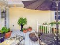 Cozy patio area featuring comfortable furniture, potted plants, and a relaxing atmosphere at 6402 23Rd Avenue W Dr, Bradenton, FL 34209