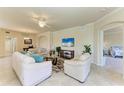 Bright and airy living room with plush seating and neutral decor at 6907 Grand Estuary Trl # 104, Bradenton, FL 34212