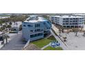 Stylish beach condo with multiple balconies, lawn and outdoor seating at 2400 N Beach Rd # 1, Englewood, FL 34223