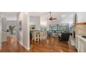 Spacious living room and dining area with hardwood floors and lots of natural light at 4514 Trails Dr, Sarasota, FL 34232