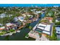 Waterfront property with boat dockage, lush landscaping, and easy access to waterways at 681 Avenida De Mayo, Sarasota, FL 34242