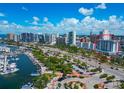 An aerial shot featuring the community with stunning views of the city skyline and marina at 101 S Gulfstream Ave # 16C, Sarasota, FL 34236