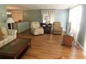 Spacious living room with hardwood floors and comfortable seating at 1212 45Th E Ave, Ellenton, FL 34222