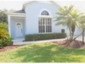 Inviting single-story home featuring well-manicured lawn and landscaping at 12301 Mosswood Pl, Lakewood Ranch, FL 34202
