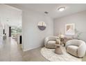 Cozy living room featuring stylish decor and comfortable seating arrangement at 12183 Longview Lake Cir, Bradenton, FL 34211