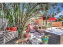 Serene backyard patio adorned with lush foliage and comfortable seating, creating a peaceful retreat at 1489 18Th St, Sarasota, FL 34234