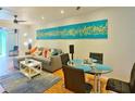 Bright living room with modern furniture and an open floor plan at 3740 Lake Bayshore Dr # 501, Bradenton, FL 34205