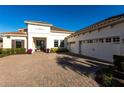 Gorgeous home featuring a spacious three-car garage and decorative landscaping that adds to its curb appeal at 7208 Prestbury Cir, Bradenton, FL 34202