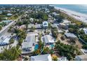 Aerial view showcasing the property's proximity to the beach and surrounding neighborhood at 112 Palm Ave, Anna Maria, FL 34216