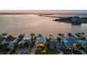 Expansive waterfront property with private docks and easy access to the open water, perfect for boating enthusiasts at 2438 Baywood W Dr, Dunedin, FL 34698