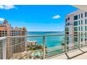 Enjoy this building's expansive balcony with beautiful turquoise water views and neighboring luxury condominiums at 301 Quay Commons Dr # 1711, Sarasota, FL 34236