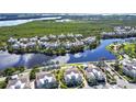 Aerial view of home, showing community and lake views at 311 Compass Point Dr # 101, Bradenton, FL 34209