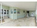 Wide covered patio with ample space for entertaining and enjoying the outdoors at 3352 Laurel Oak Way, Sarasota, FL 34237