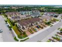 A beautiful aerial view of a neighborhood with well-maintained homes and lush greenery at 5007 Sunnyside Ln, Bradenton, FL 34211