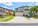Charming two-story home with a two-car garage and manicured landscaping at 7844 52Nd E Ter, Bradenton, FL 34203