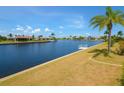 Waterfront property with dock access and stunning views in a tranquil neighborhood at 1450 Aqui Esta Dr, Punta Gorda, FL 33950