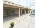 Spacious covered patio with a partial view of the private pool area at 1450 Aqui Esta Dr, Punta Gorda, FL 33950