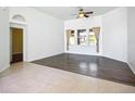 Bright living room features hardwood flooring and recessed lighting fixtures at 4239 Corso Venetia Blvd, Venice, FL 34293