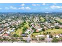 Picturesque neighborhood with mature trees, well-manicured lawns, and views of the bay at 3432 Pine Valley Dr, Sarasota, FL 34239