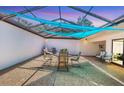 Enclosed patio area offers shade, pavers, privacy and ample space for seating at 3919 Glen Oaks Manor Dr, Sarasota, FL 34232