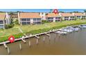 Private docks with boat access offering a serene waterfront living experience at 8710 54Th W Ave # 8710, Bradenton, FL 34210