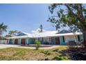 Charming single-Gathering home with a pristine lawn, two-car garage, and ample curb appeal at 1021 Estremadura Dr, Bradenton, FL 34209