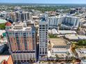 Elevated view of the modern building, capturing the urban skyline and surrounding cityscape with architectural details at 33 S Palm Ave # 1202, Sarasota, FL 34236