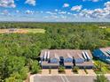 Beautiful aerial view of townhomes backing up to green space and the local ballfields at 4500 Chinkapin Dr, Sarasota, FL 34232