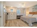 Inviting studio with a bed, couch, kitchenette, and a bright, airy feel at 105 Casey Key Rd # 20, Nokomis, FL 34275