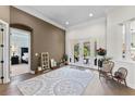 Bright living room with pool views at 2152 Majestic Oaks Blvd, Clearwater, FL 33759