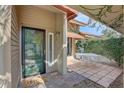 Inviting entryway featuring a stylish door, outdoor patio, and ample natural light at 5039 Kestral Park Dr # 67, Sarasota, FL 34231