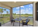 Relax on this screened-in lanai offering lovely views of the lake, golf course and tropical landscaping at 7005 River Hammock Dr # 203, Bradenton, FL 34212